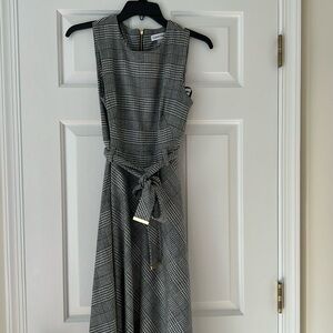 Black and white plaid jumper dress.